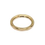 AN 18CT GOLD BEVELLED WEDDING BAND, CIRCA 1994