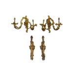 A PAIR OF GILT BRONZE ORMOLU TWIN BRANCH WALL SCONCES IN THE ROCOCO MANNER