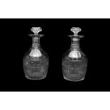 A PAIR OF GEORGE III CUT GLASS DECANTERS OF MALLET SHAPE, CIRCA 1800