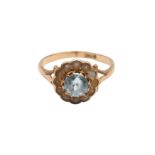 AN AQUAMARINE AND SEED PEARL CLUSTER RING