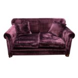 A CONTEMPORARY TWO SEATER SOFA