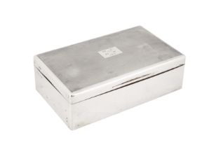 A George V sterling silver cigarette box, London 1929 by T.F and Co