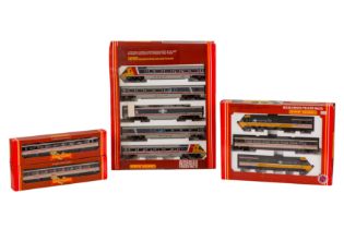 TWO HORNBY OO GAUGE TRAIN PACKS & TWO COACHES