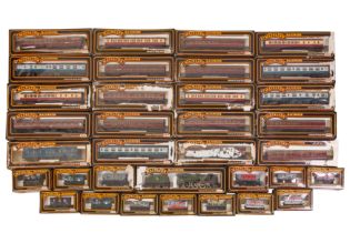 A LARGE GROUP OF ASSORTED OO GAUGE LOCOMOTIVES, CARRIGES AND WAGONS