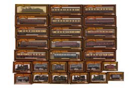 A LARGE GROUP OF ASSORTED MAINLINE OO GAUGE LOCOMOTIVES AND ROLLING STOCK