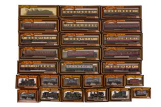 A LARGE GROUP OF ASSORTED MAINLINE OO GAUGE LOCOMOTIVES AND ROLLING STOCK