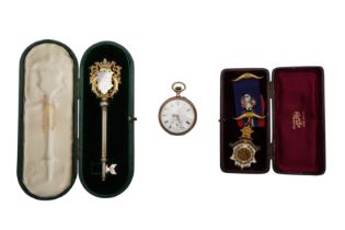 A SILVER KEY, A MEDAL AND A POCKET WATCH