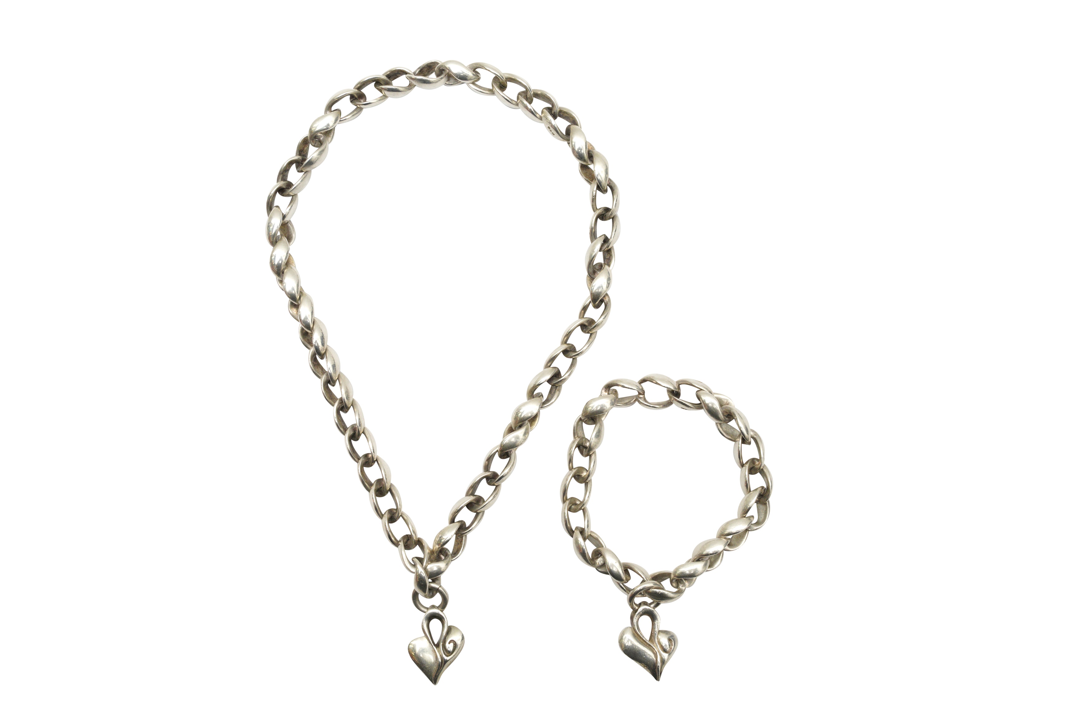A SILVER CURB-LINK NECKLACE AND BRACELET SUITE, CIRCA 1994