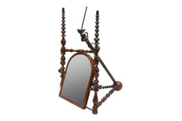 A VICTORIAN WALNUT 'FACE ET NUQUE' MIRROR, CIRCA 1856