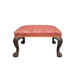 A MAHOGANY STOOL, PROBABLY IRISH, CIRCA 1750