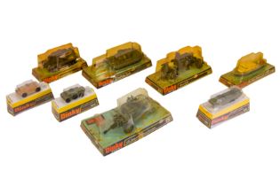 A GROUP OF EIGHT LATE DINKY MILITARY VEHICLES IN BUBBLE PACKAGING