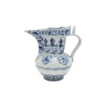 A CHINESE BLUE AND WHITE MING-STYLE MONK'S CAP EWER
