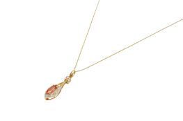 A PADPARADSCHA SAPPHIRE AND DIAMOND PENDANT NECKLACE