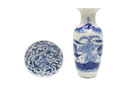 A CHINESE BLUE AND WHITE DISH FOR THE VIETNAMESE MARKET AND A VASE