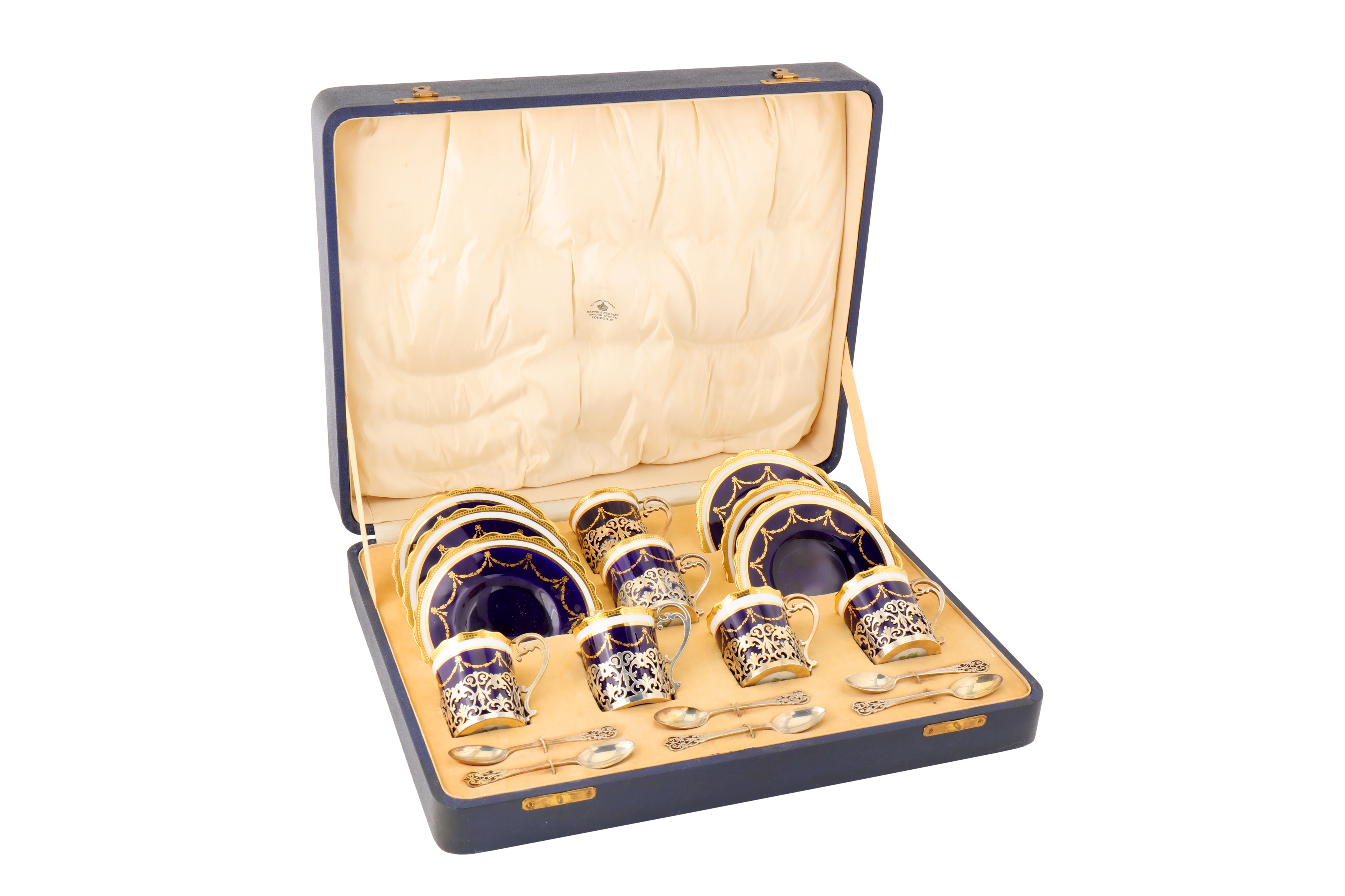 A cased George V sterling silver mounted demitasse set, London 1933/34 by Mappin and Webb