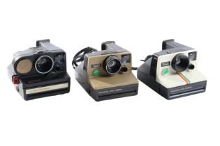 Three Polaroid 600 Cameras.