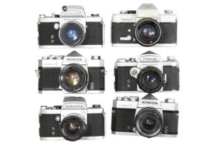Six Mechanical 35mm SLR Cameras with Lenses.