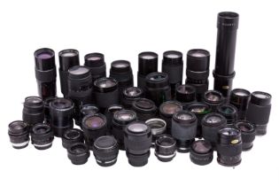 A Large Quantity of Manual Focus Aftermarket Lenses