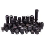 A Large Quantity of Manual Focus Aftermarket Lenses