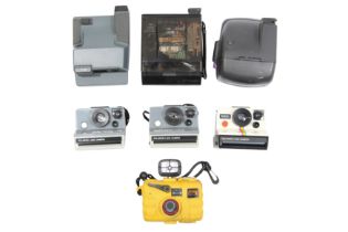 Five Polaroid Cameras & Reefmaster Automatic Underwater Camera.