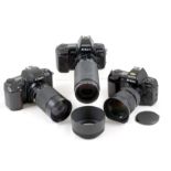Group of Nikon F-801 SLRs & Aftermarket Manual Focus Lenses.