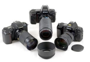Group of Nikon F-801 SLRs & Aftermarket Manual Focus Lenses.
