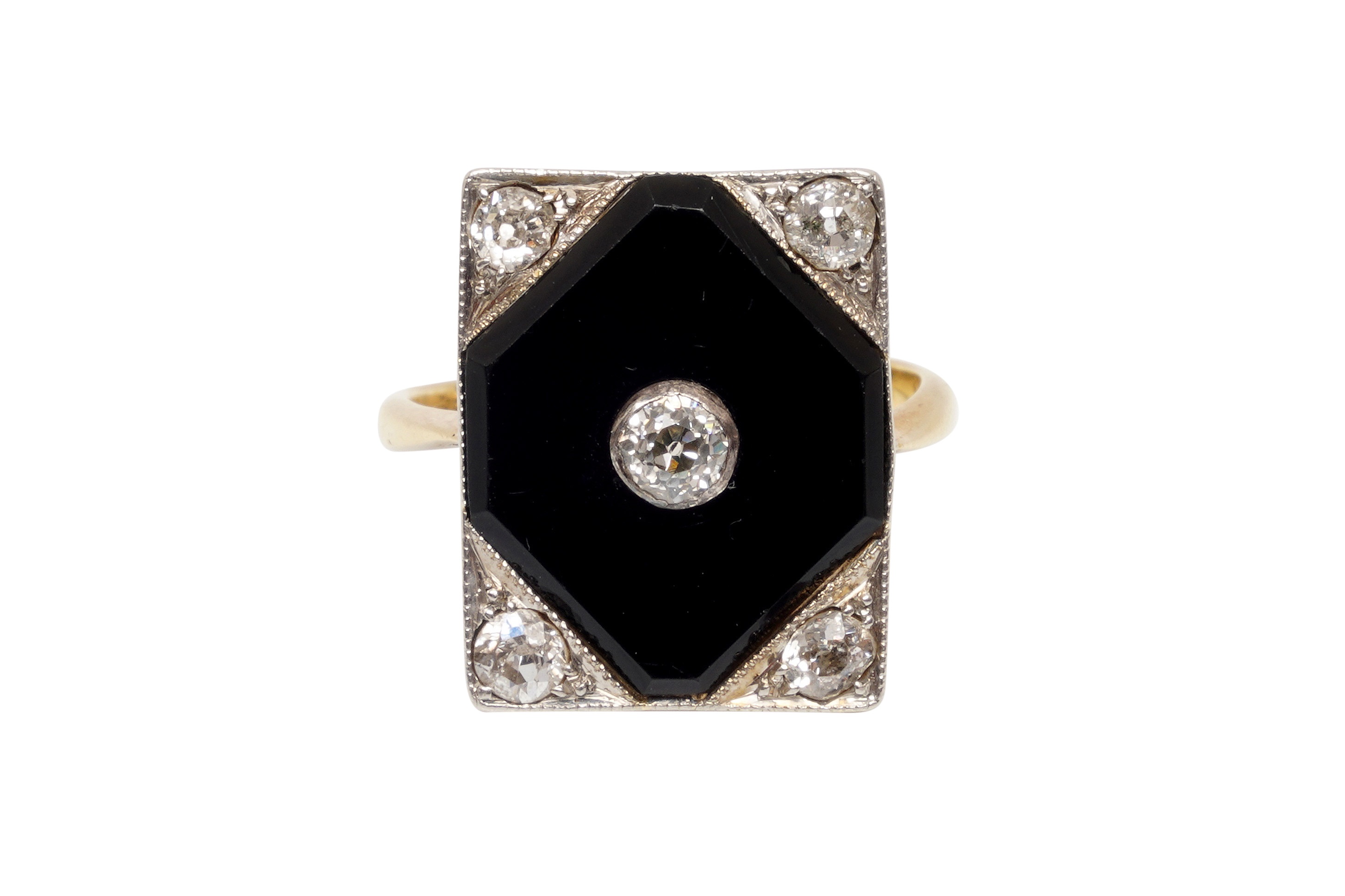 AN ART DECO BLACK ONYX AND DIAMOND RING