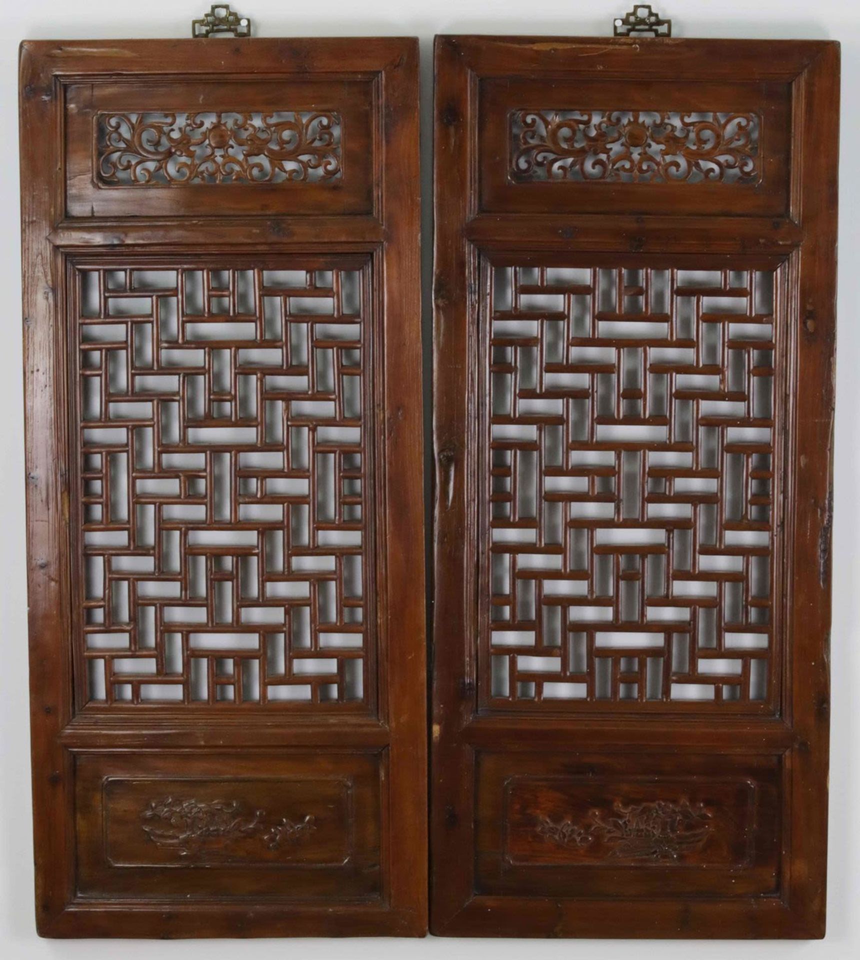 Set of two Chinese pine wood open fretwork panels, 20th Century