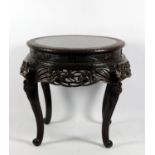 A Japanese carved wooden iris table, Meiji period (1868-1912)