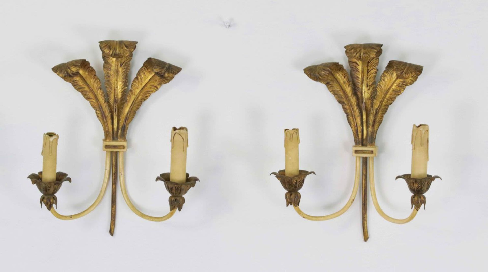 A set of two French feather gilt bronze wall sconces, Circa 1950s