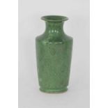 A Korean green glazed vase with floral relief design, 19th/20th Century