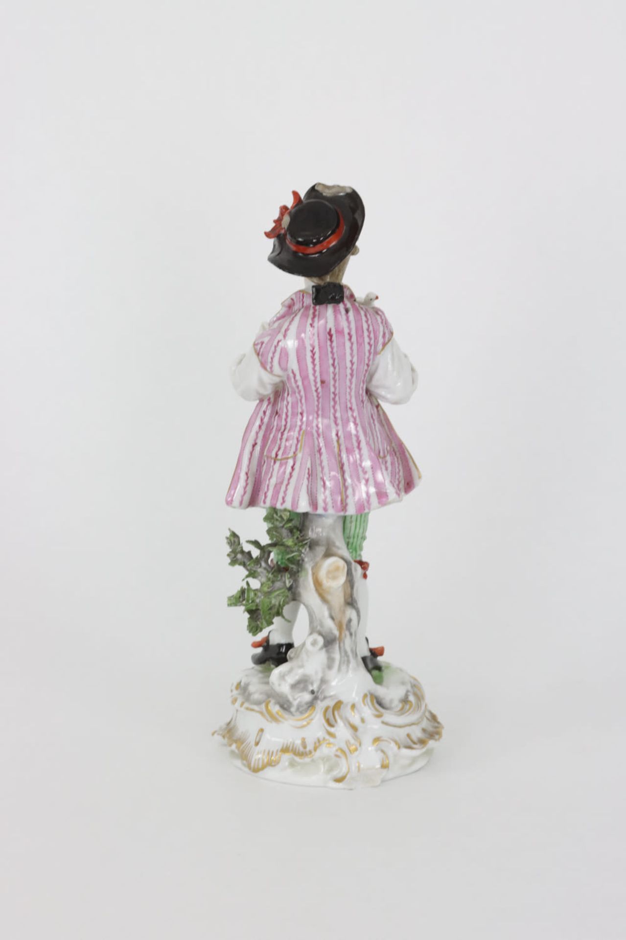 A porcelain statue of a gentleman holding a dove, first quarter 20th Century - Image 4 of 6