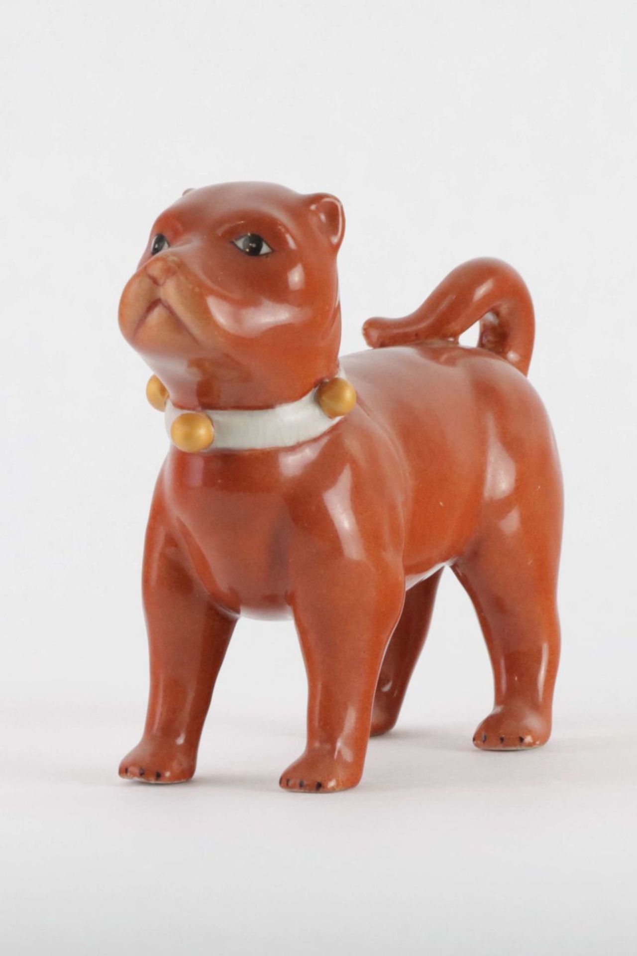 A Chinese porcelain figure of a chongqing dog, Qing Dynasty