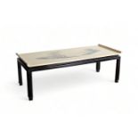 Paul Vandenbulcke for De Coene: A wooden coffee table with lacquered ivory coloured top in the Japan