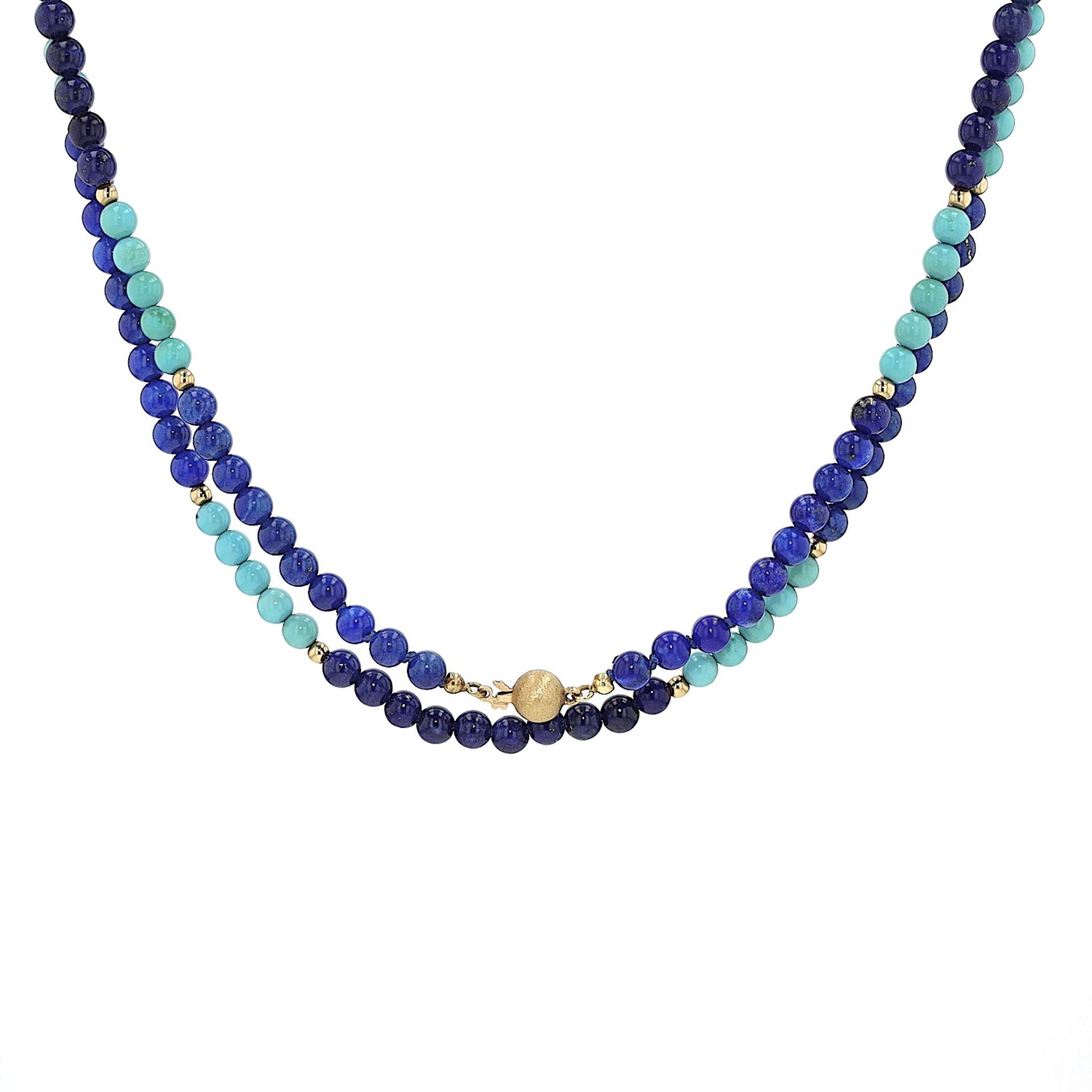 Necklace with gold beads and gemstone
