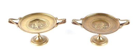 A pair of 19th century snake handled Grand Tour bronze tazzas with central classical figural