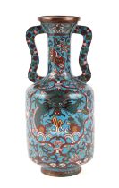A Chinese two handled cloisonné vase decorated dragons and scrolling stylised flowers on a turquoise