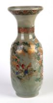 A late 19th century Japanese vase decorated with a gilded tiger and hrhat with mounded flowers on