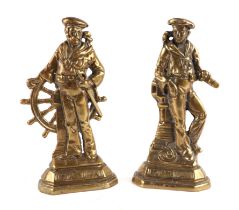 A pair of Victorian cast brass door stops in the form of sailors, both titled 'Britain's Pride',