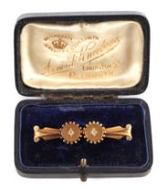 A Victorian yellow metal and diamond set bar brooch, 3.6g, cased.