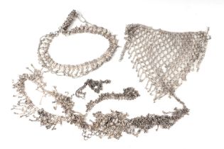 A quantity of assorted Indian silver coloured metal jewellery to include necklaces, 974g.