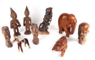 A group of African tribal carvings to include fertility figures and busts.