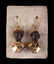 A pair of yellow metal mounted Blackamoor drop earrings.