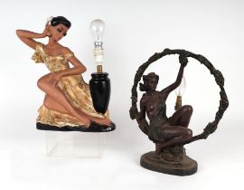 A 1950's vintage plaster figural table lamp depicting a Spanish lady with flowers in her hair,