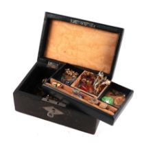 A leather jewellery box containing vintage costume jewellery to include hat pins, brooches