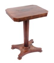 A Regency figured mahogany occasional table, the rectangular top with canted corners, on an