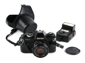 A Ricoh XR6 35mm camera, cased.