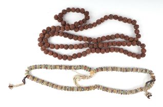 An Indian Rudraksha seed necklace; together with a similar necklace.