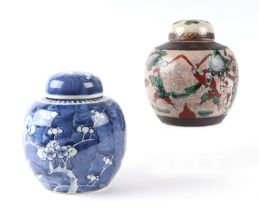 A Chinese blue and white ginger jar and cover, decorated prunus on a cracked ice ground; together