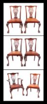 A set of Georgian style mahogany chairs with pieced backs plats, on cabriole front supports
